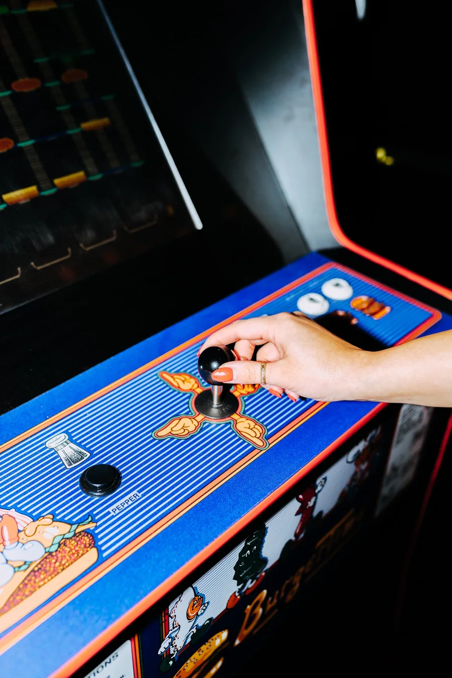 A guest playing Burger Time at Select Start